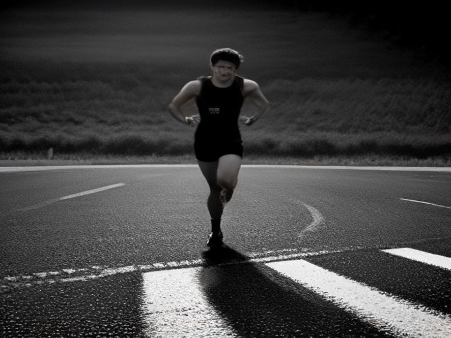 Runner mid-stride at dawn